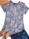 Super cute! This knit top has mauve flowers on a denim blue background. Love it! 